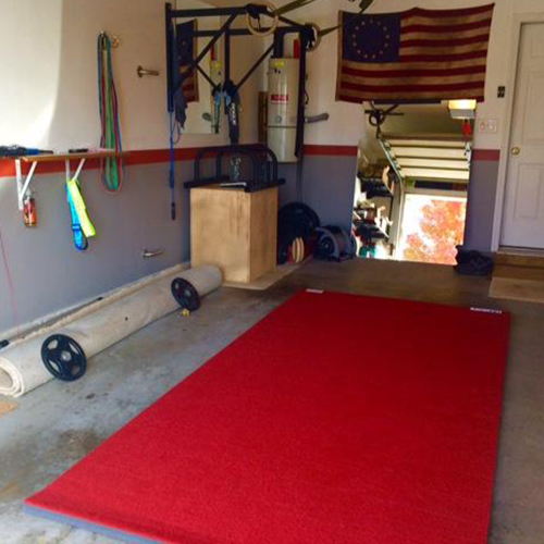 Red Home Cheer Mat in Garage