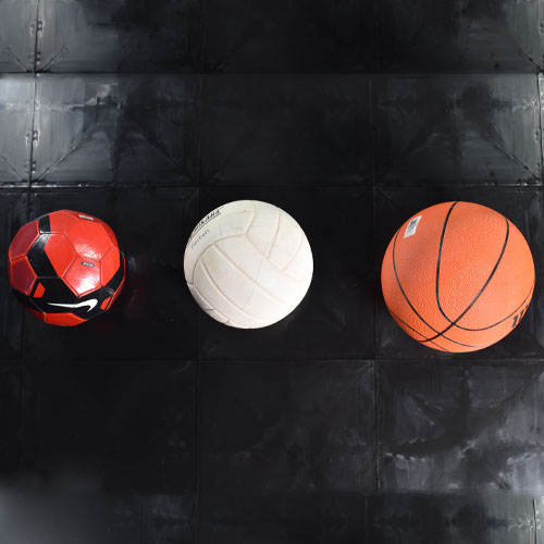 sports balls on black modular snap together tiles