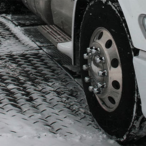 Ground Protection Mats 4x8 ft Black Diamond/Smooth with truck in snow