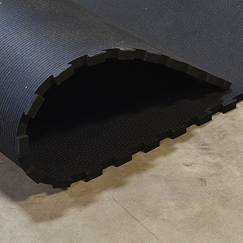 Horse Stall Mats Kit 3/4 Inch x 8x10 Ft. mat curled up