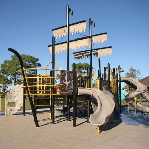 Blue Sky Playground Interlocking Tile 4.25 Inch Colors installation with a pirate ship.