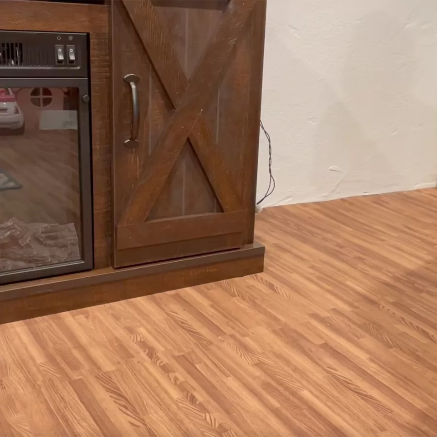 wood grain foam tile flooring in basement with tv console