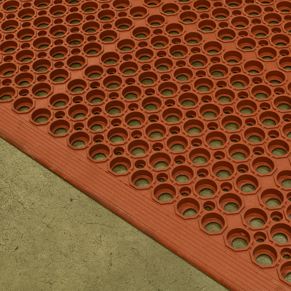 VIP Topdek Senior Red Mat 3 x 14 Feet 8 Inches close up showing holes in rubber mat and beveled edge