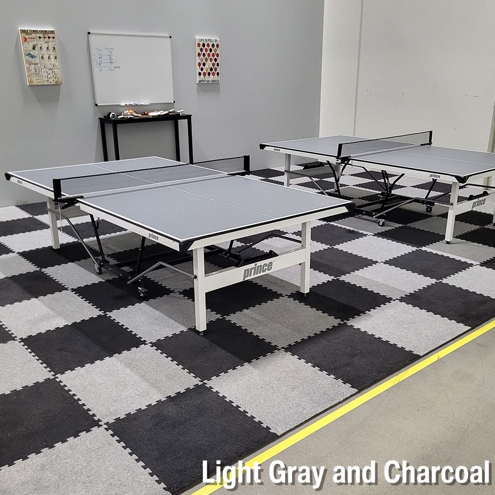 light and dark gray carpet tiles in game room with ping pong tables