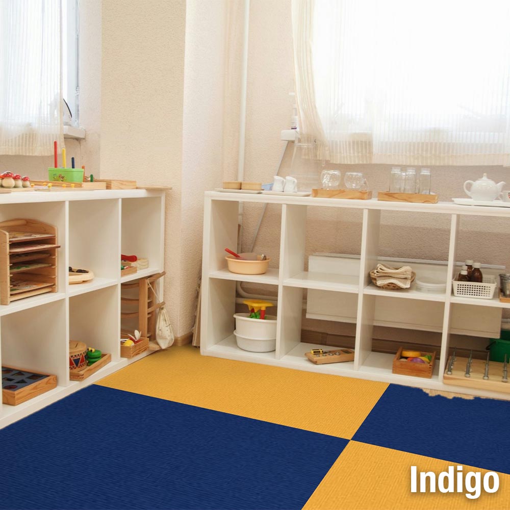 blue and yellow carpet tiles in daycare classroom