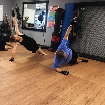 Bodyweight exercises on foam mat flooring wood look