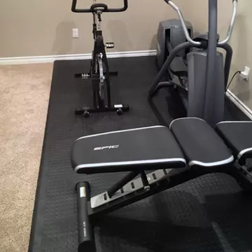 Can you put exercise equipment on carpet hot sale