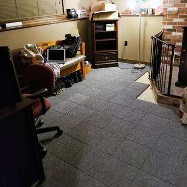 Raised carpet tiles for basements