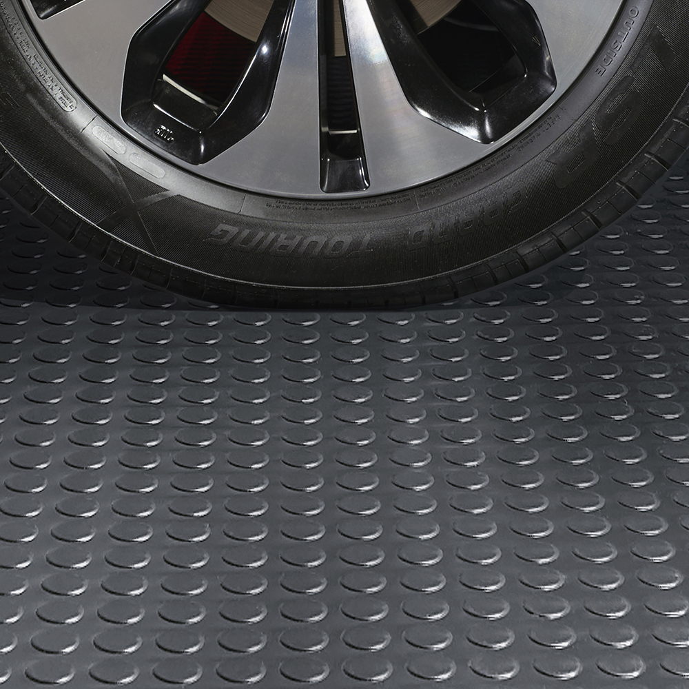 G-Floor Coin Tread Garage Floor Roll 75 mil x 7.6x17 Ft. in slale gray wheel close up