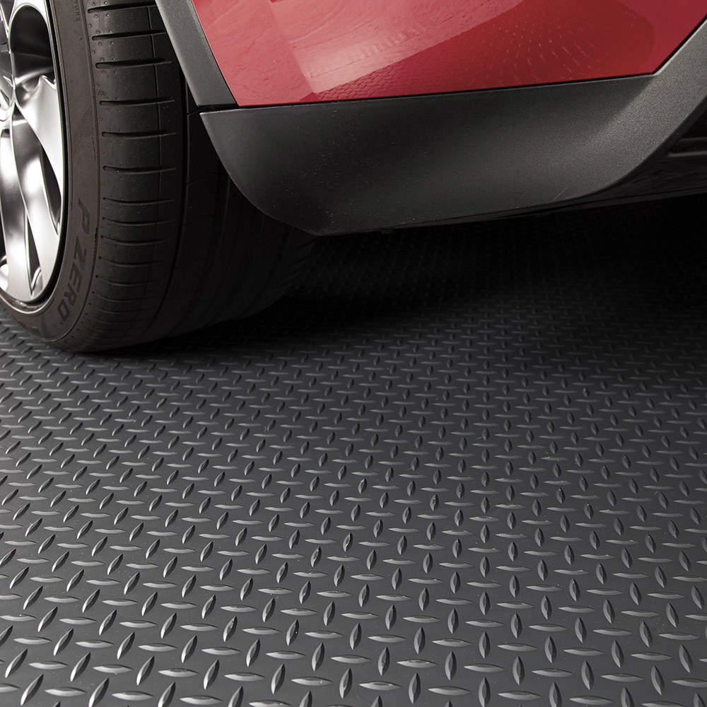 G-Floor Diamond Tread Garage Floor Roll 75 mil x 7.6x17 Ft. Midnight Black back of car and tile