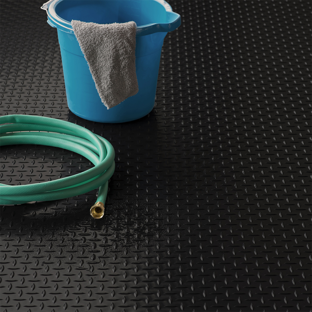 G-Floor Lite Diamond Tread Garage Floor Roll 45 mil x 7.6x14 Ft. bucket and hose on mat in midnight black