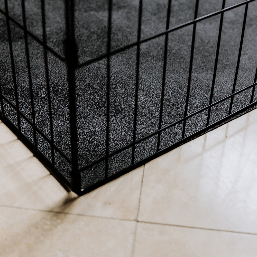 G-Floor Protective Kennel Floor Mat Levant Texture 55 mil x 5x10 Ft. close up of kennel with midnight black mat