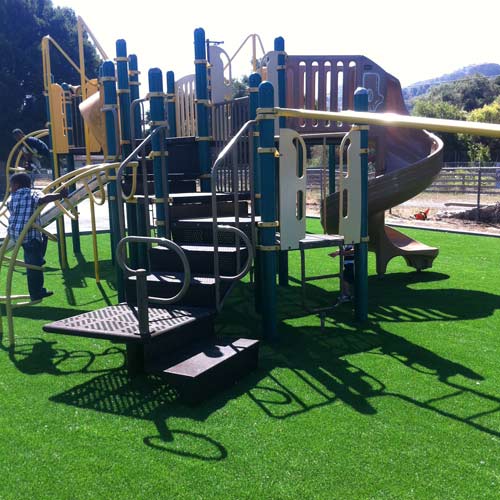 playground artificial turf over dirt 