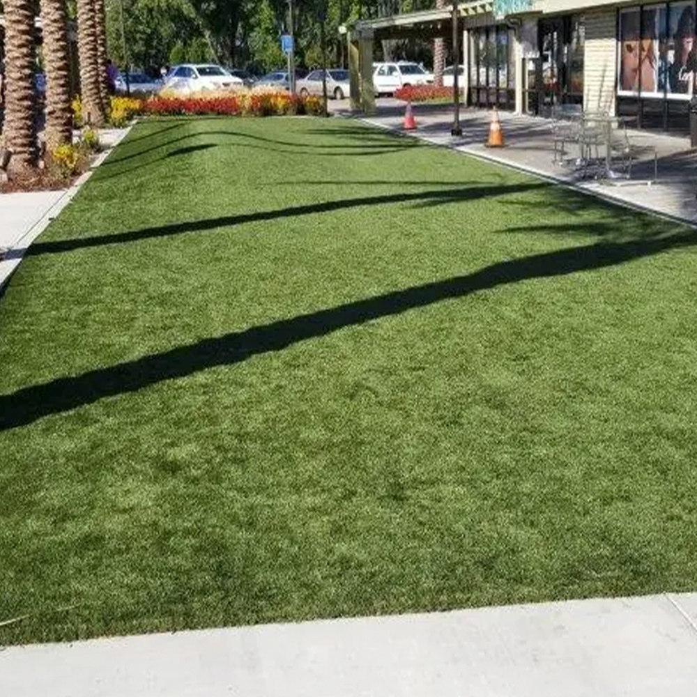 Commercial installation of Natures Cut Artificial Grass Turf 1-5/8 Inch x 15 Ft. Wide Per SF 