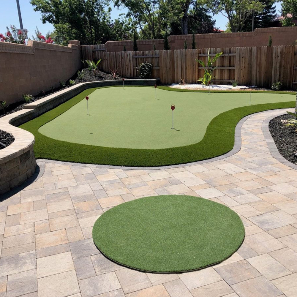 perfect putt turf in backyard patio area with putting green