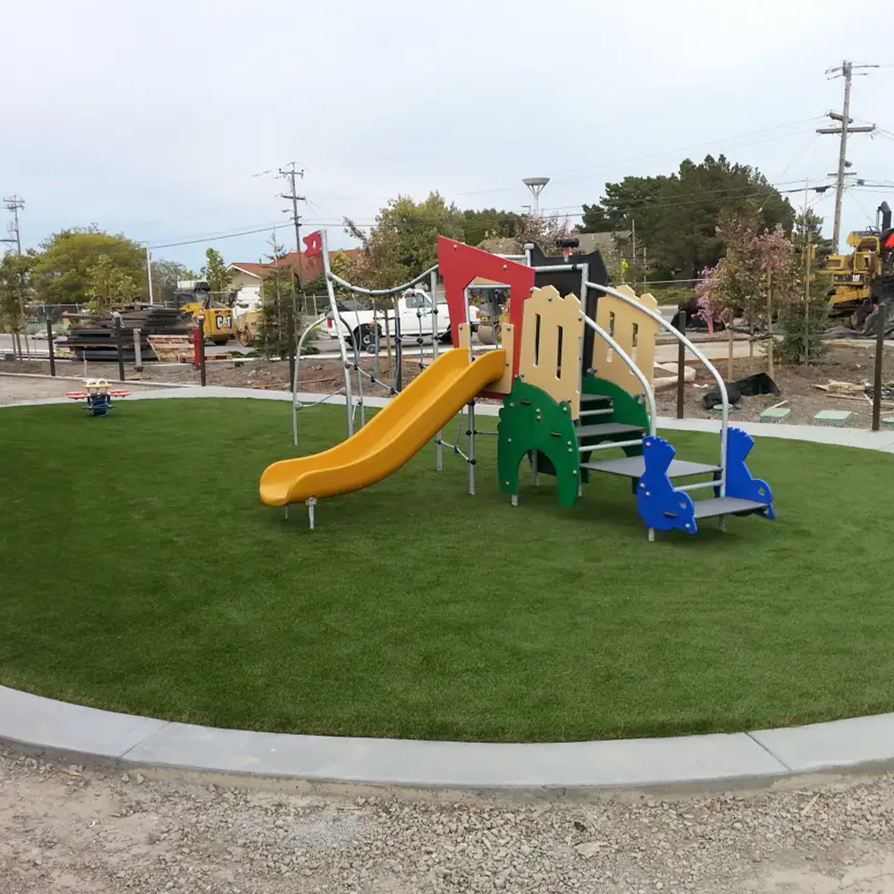 small playground with artificial turf