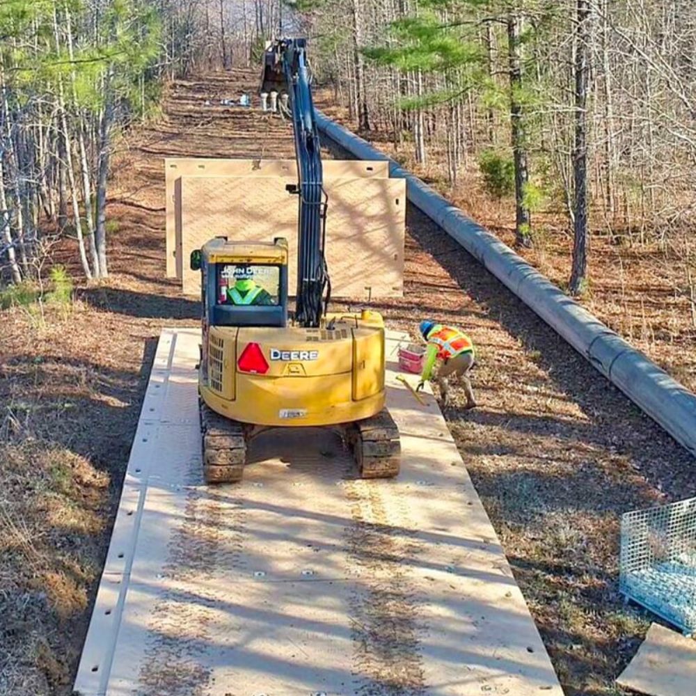 Ground Protection Mats System7 Mat 8 ft X 14 ft install in forest