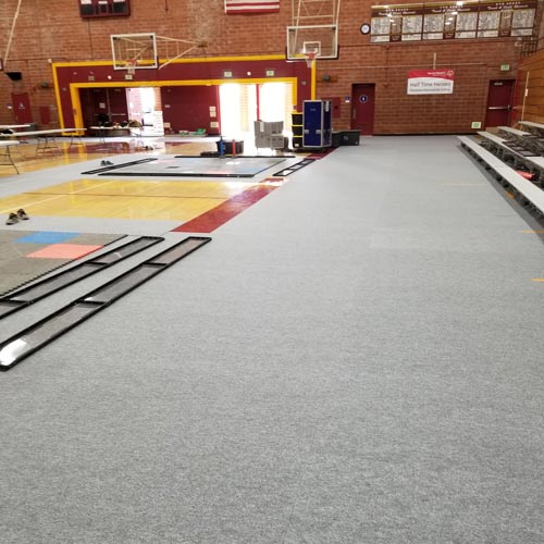 Gym Floor Covering Carpet Tile marauders installed in school gymnasium