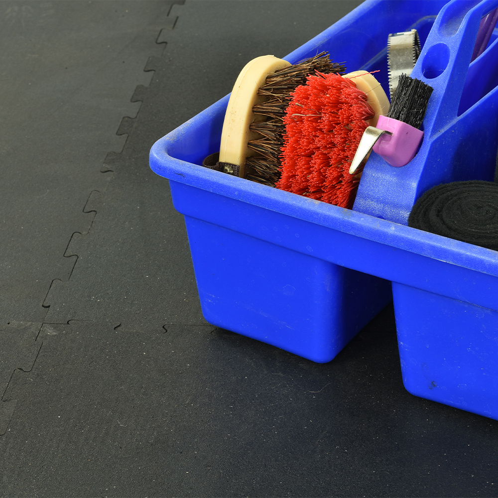 interlocking rubber horse stall mats in grooming area