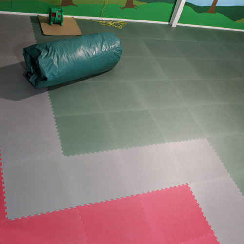Fall safety rated flooring for indoor playground area