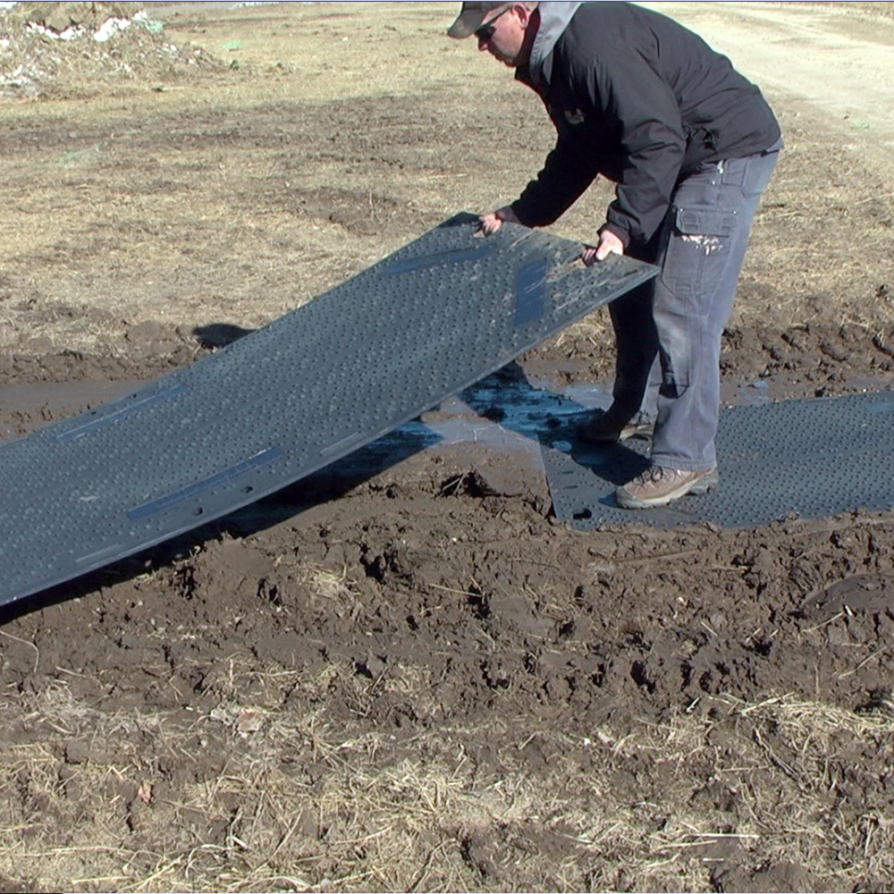 temporary outdoor mats over mud for walkway or sidewalk