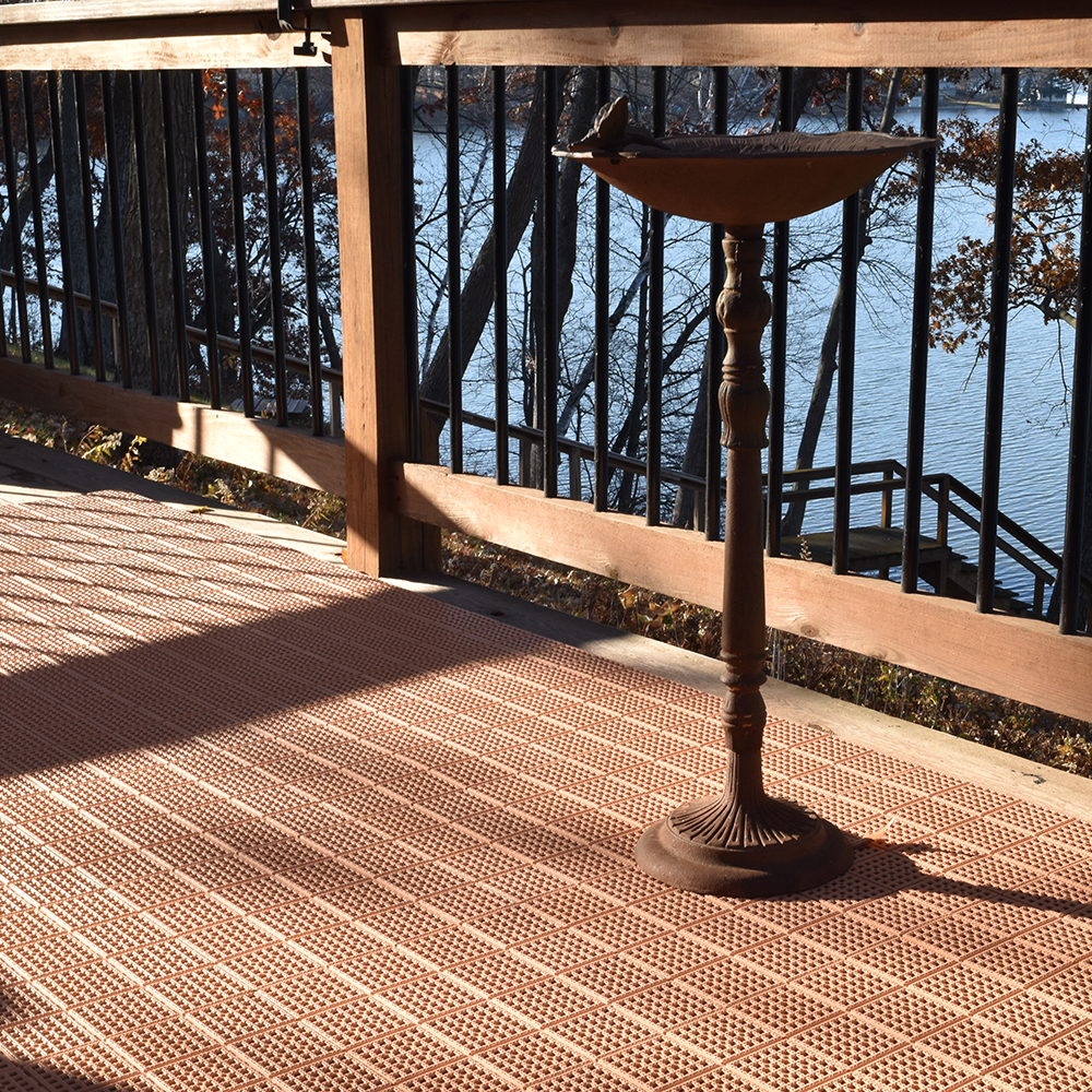 outdoor floor tiles installed over existing wood deck