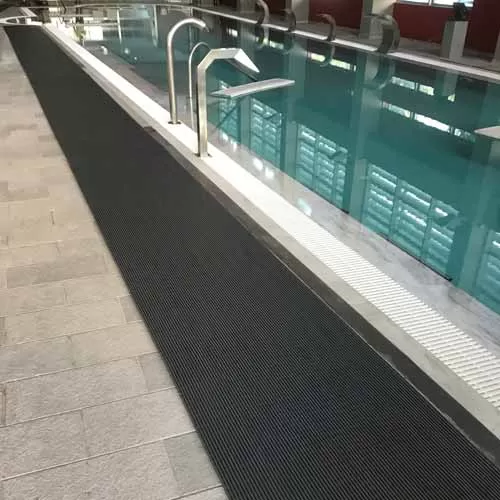 heronrib wet area matting by indoor pool