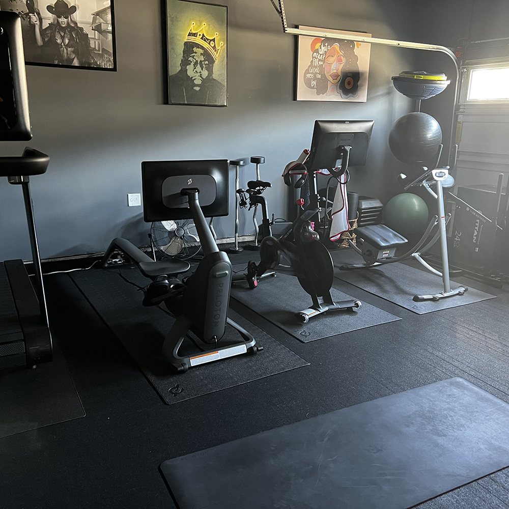 garage gym with equipment and plyometric rubber flooring