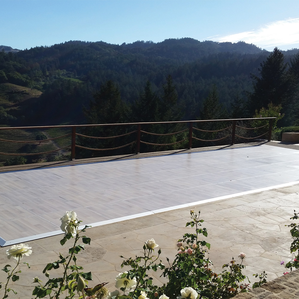 raised interlocking floor tiles for an outdoor wedding dance area