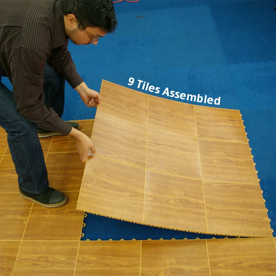 https://www.greatmats.com/images/portable-dance-floor/portable-dance-floor-tiles-install.jpg