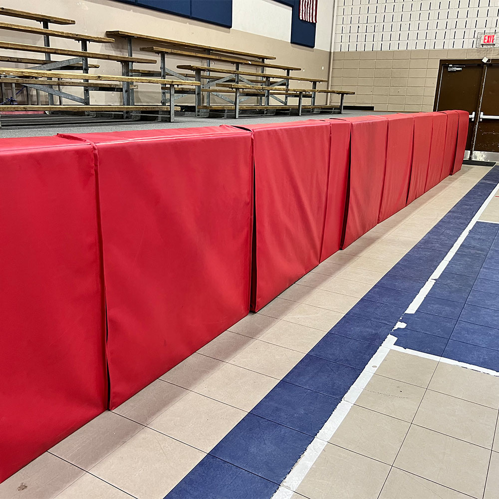 solid red stage mats in auditorium