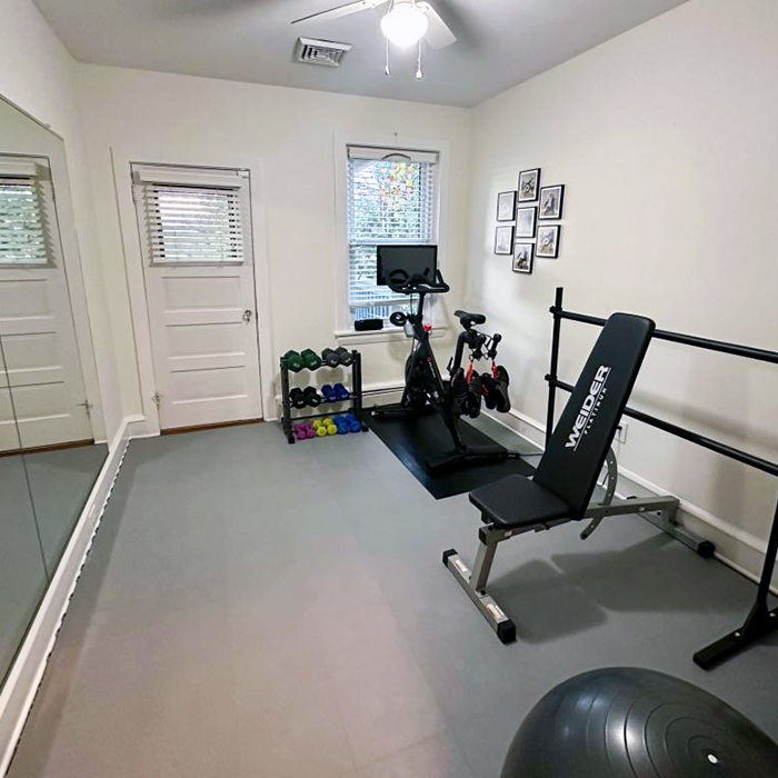 snap together gray floor tiles in home gym 