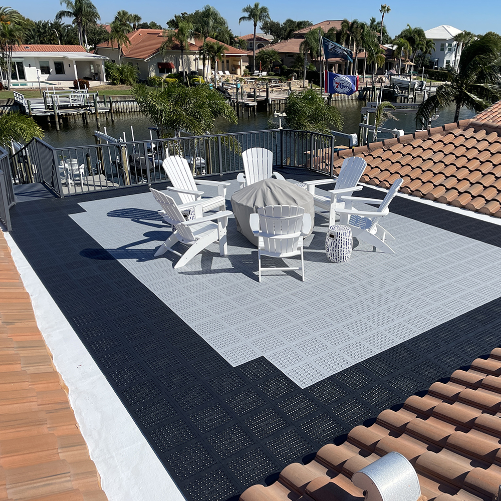 staylock perforated tiles in black and gray on roofop patio on a spanish style roof