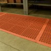 VIP Topdek Senior Red Mat 3 x 14 Feet 8 Inches over concrete next to workshop bench