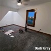 dark gray plush carpet tiles installation in bedroom 