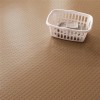 Sandstone roll of G-Floor Coin Tread Garage Floor Roll 75 mil x 7.6x17 Ft. with laundry basket