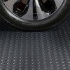 G-Floor Coin Tread Garage Floor Roll 75 mil x 7.6x17 Ft. in slale gray wheel close up