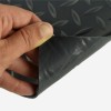 Midnight black G-Floor Diamond Tread Garage Floor Roll 75 mil x 7.6x17 Ft. corner curled up bottom