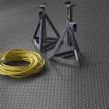 G-Floor Diamond Tread Garage Floor Roll 75 mil x 7.6x17 Ft. jack stand and cord on slate gray roll