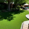 Backyard landscape using Natures Cut Artificial Grass Turf 1-5/8 Inch x 15 Ft. Wide Per SF 