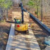 Ground Protection Mats System7 Mat 8 ft X 14 ft install in forest