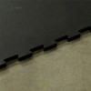 interlocking edge of rubber equine stall mat over concrete