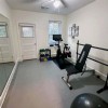 snap together gray floor tiles in home gym 