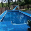 blue StayLock Interlocking Deck Tiles used for outdoor pool side flooring