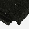 Close up of corner of Sterling Walkway Pad Roof Top Black 2 Inch x 2x2 Ft.
