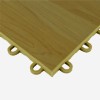 Corner of VersaCourt Pro Wood Grain Court Tile 1/2 Inch x 12x12 Inches