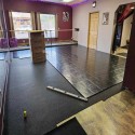 subfloor tile installation in dance studio