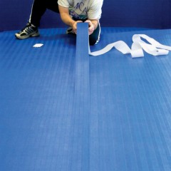  Installing royal blue mats with Flexi-Roll Seam Tape with Tatami Texture 4 Inch x 65 Ft.