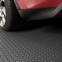 G-Floor Diamond Tread Garage Floor Roll 75 mil x 7.6x17 Ft. Midnight Black back of car and tile