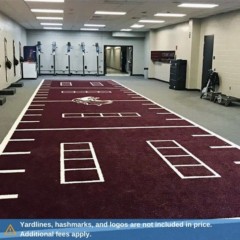 V-Max Maroon colored gym turf in weight room with logo hashmarks and ladders